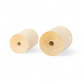 koka cilindri in 40 × 60 mm un 50 × 60 mm izmēri sakrauti kopā